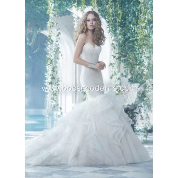 White mopping wedding dress